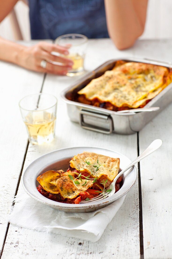 Vegetarian ratatouille lasagne with pepper, aubergine, courgette, onion and tomatoes