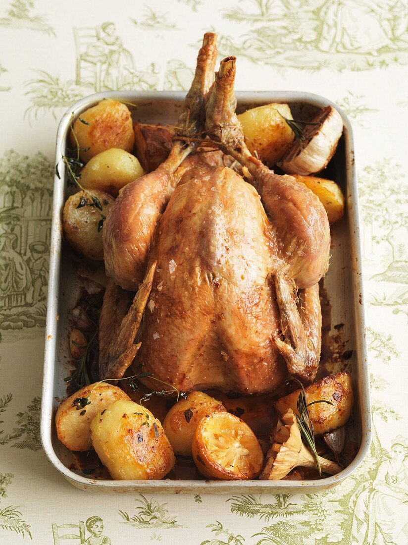 Roast chicken with herb potatoes