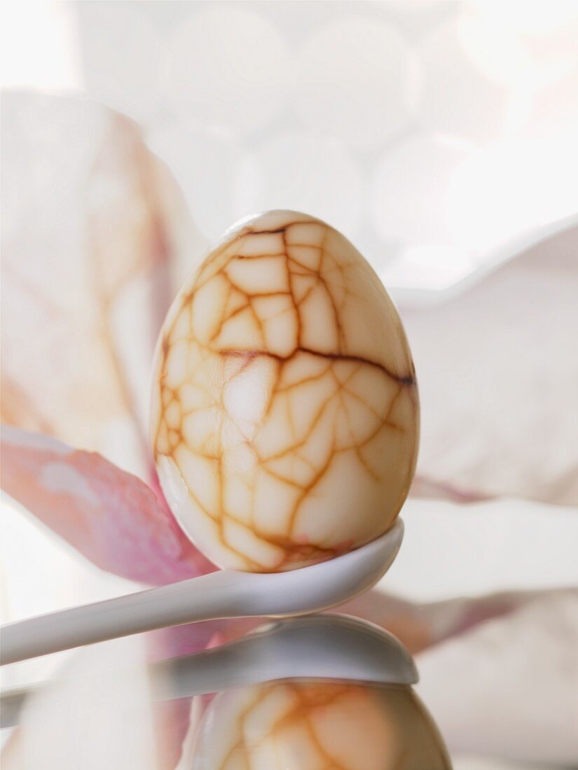 A marbled egg cooked in tea
