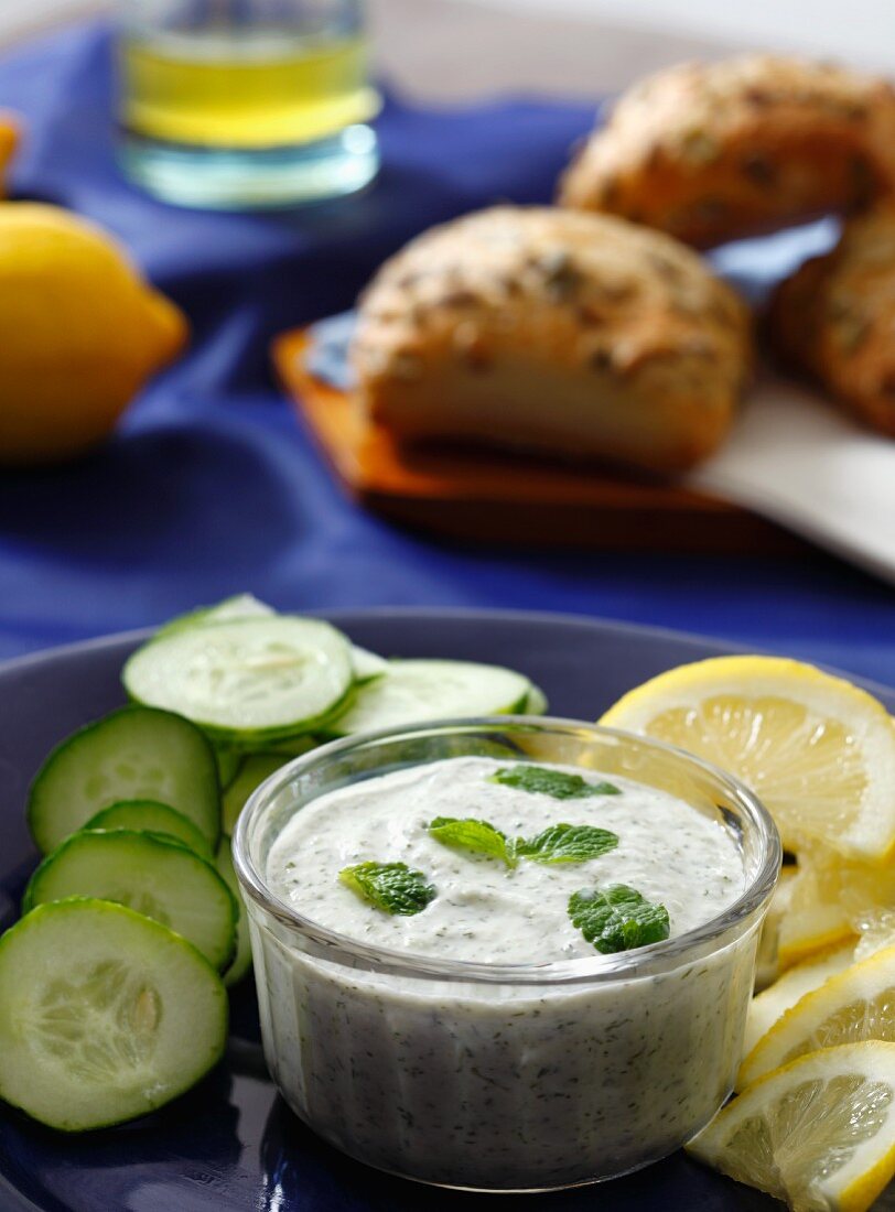 Tzatziki with cucumbers, olives and lemons