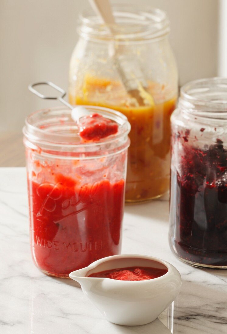 Homemade strawberry jam, mulberry jam and mango chutney