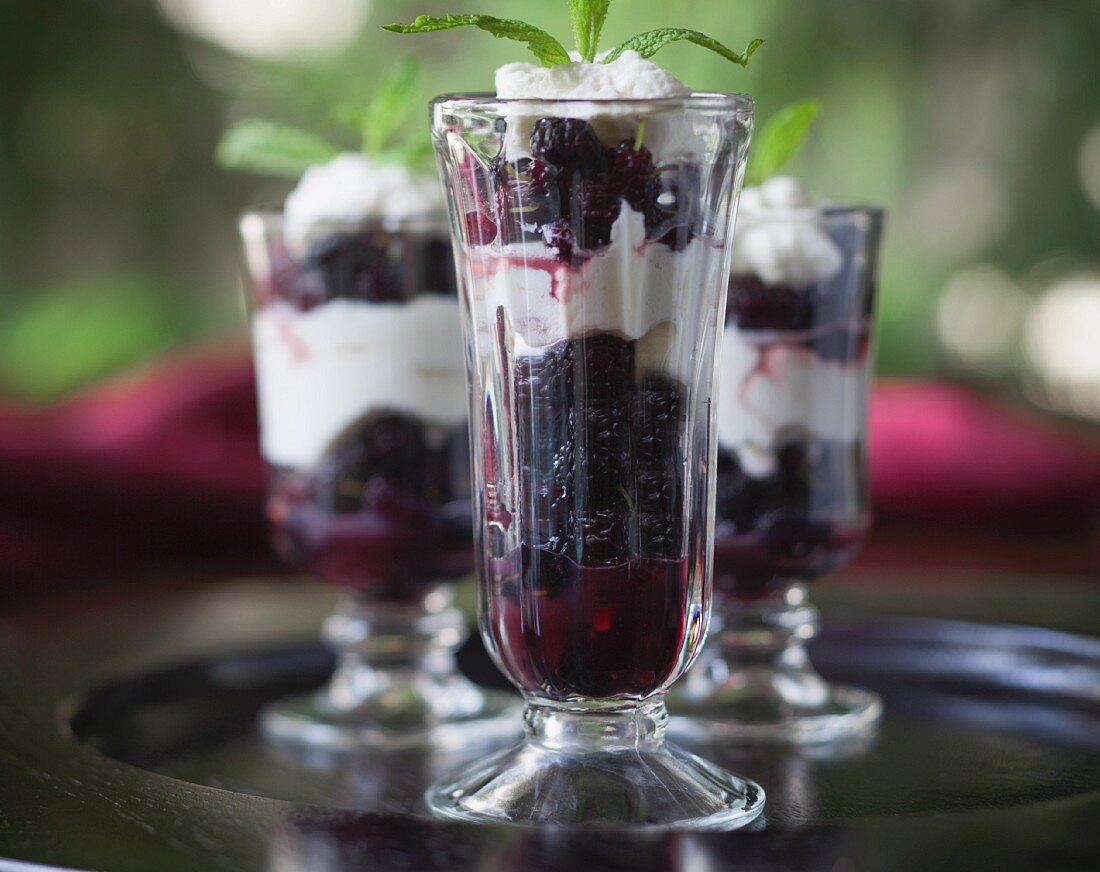 Three glasses of mulberry parfait