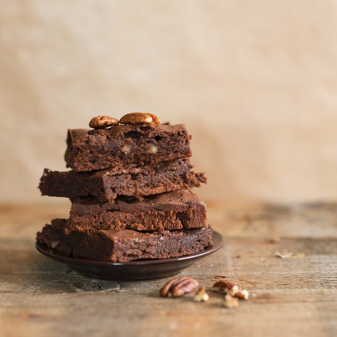 A stack of pecan nut chocolate brownies