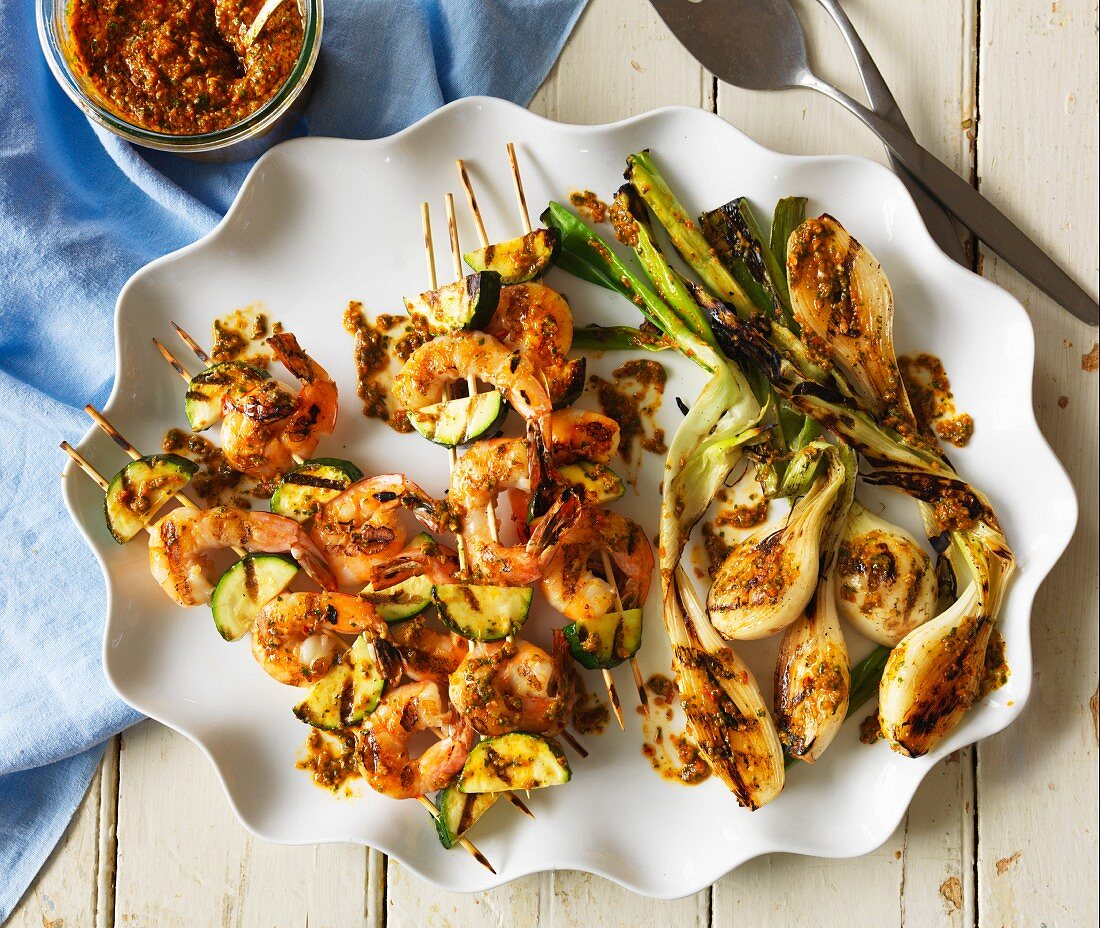 Grilled prawn skewers and spring onions with chermoula