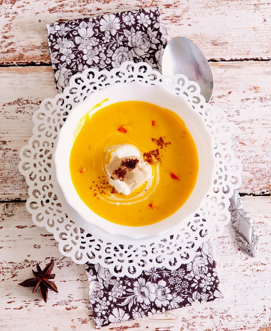 Sweet pumpkin soup with star anise and cinnamon cream