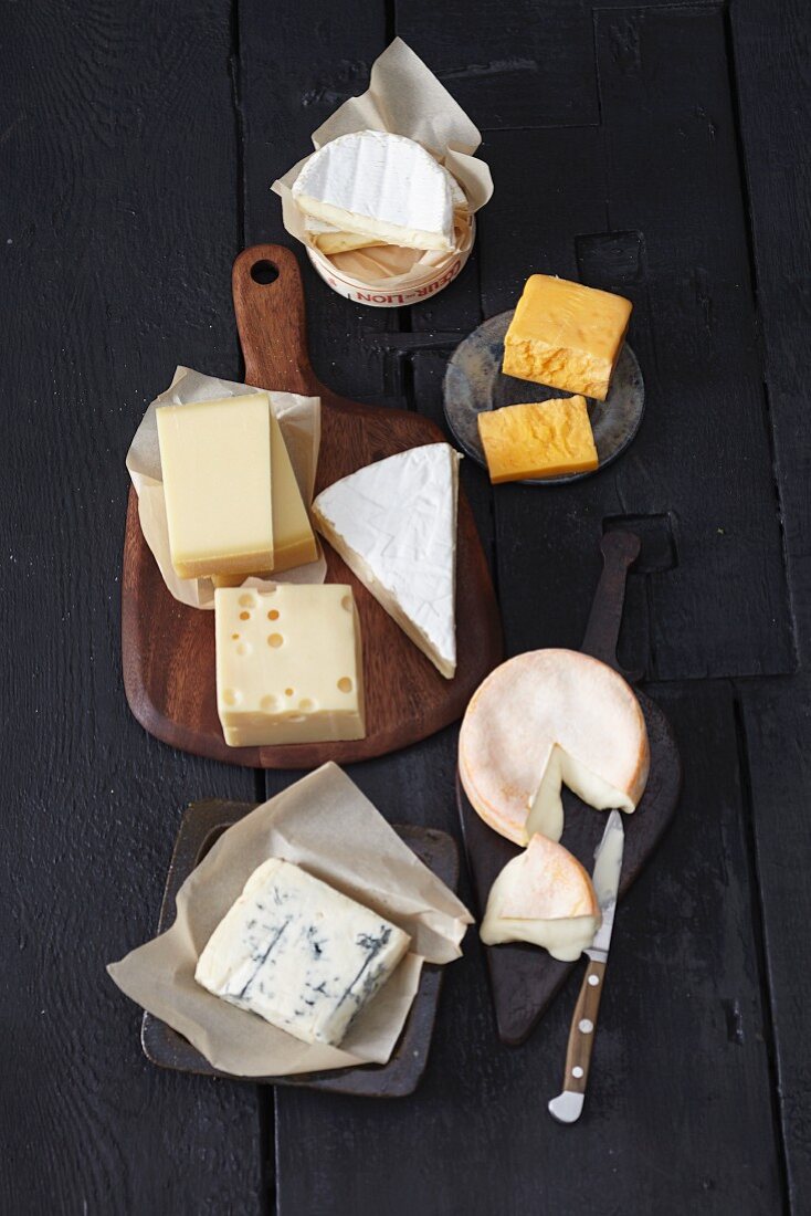An arrangement of various different cheeses for fondue