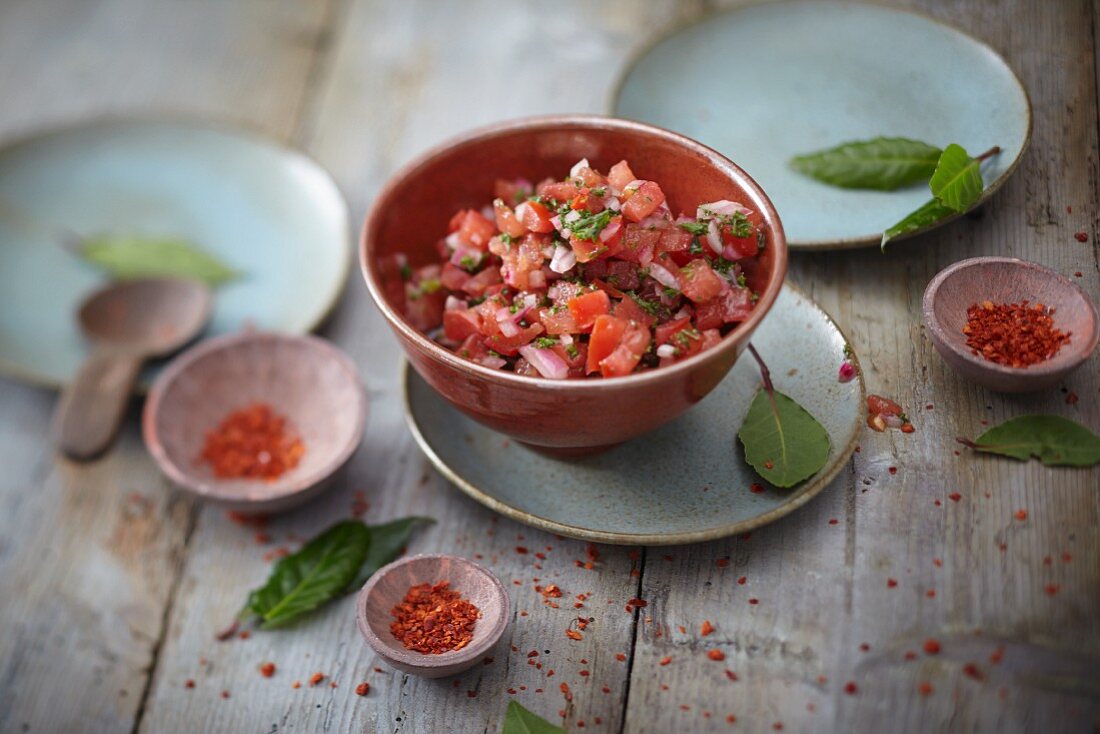 Chimi-churri with tomatoes, chilli, red onions and pepper flakes