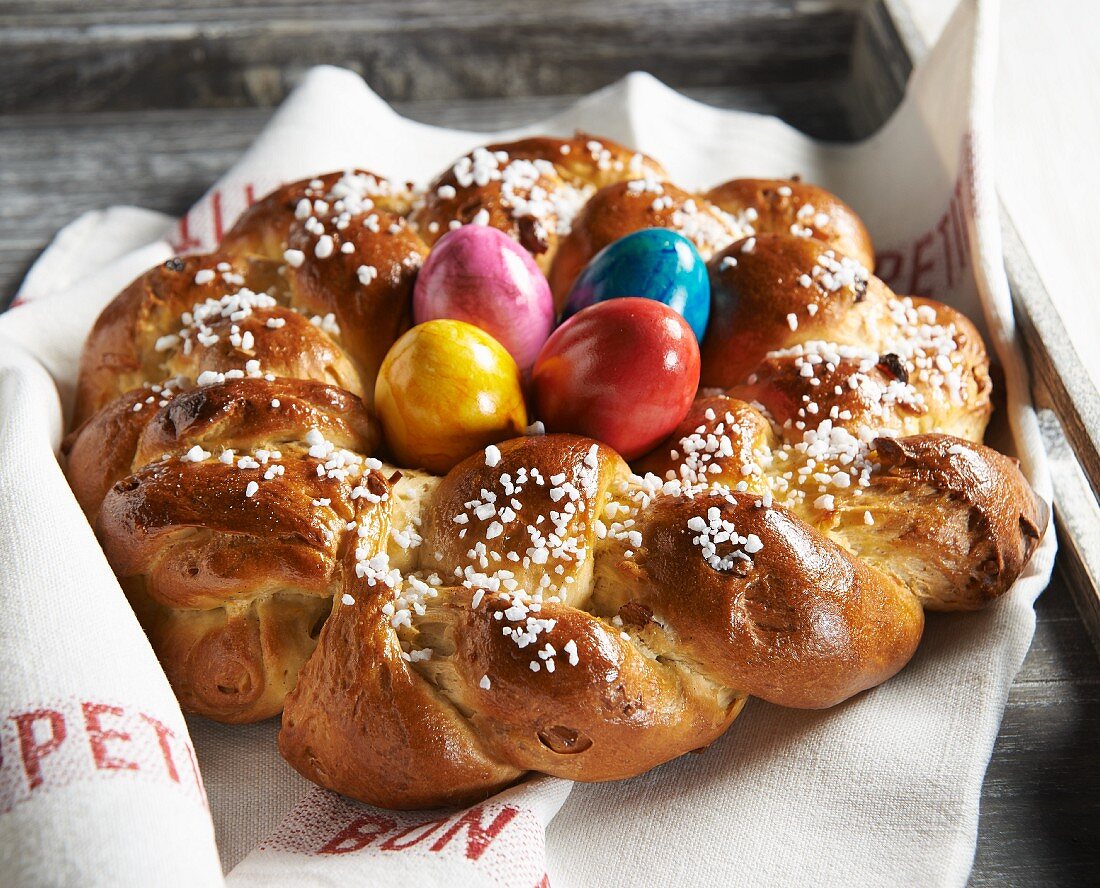 An Easter wreath with sugar nibs and coloured eggs