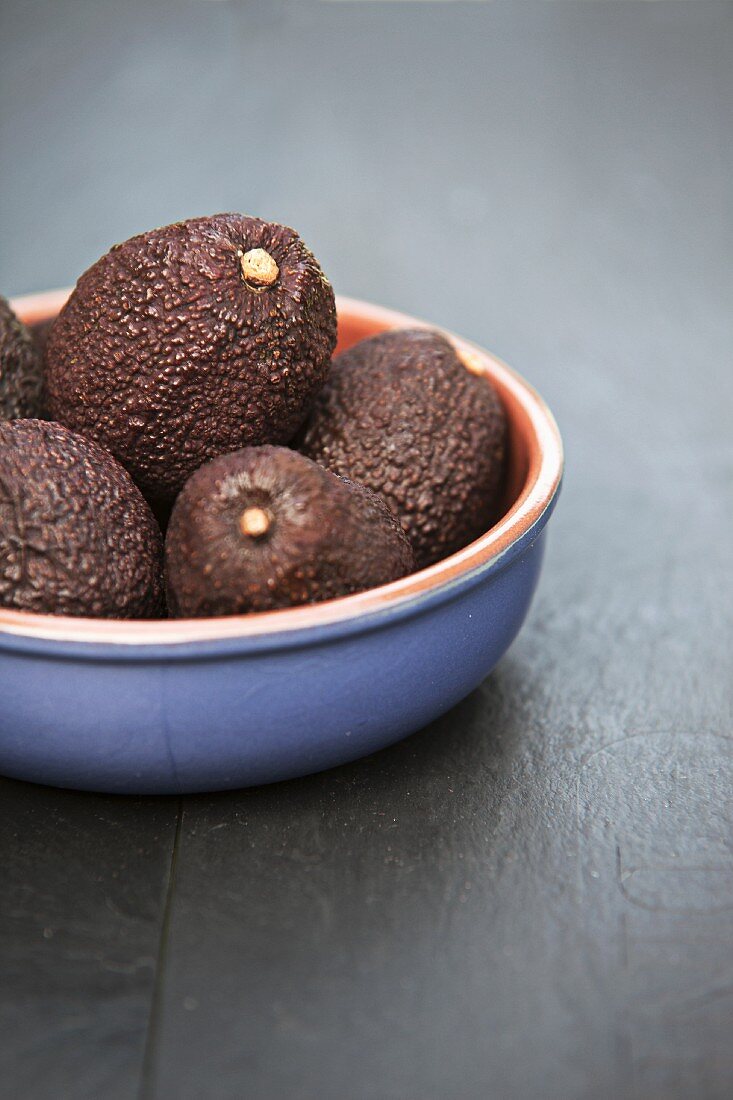 Avocados in blue bowl