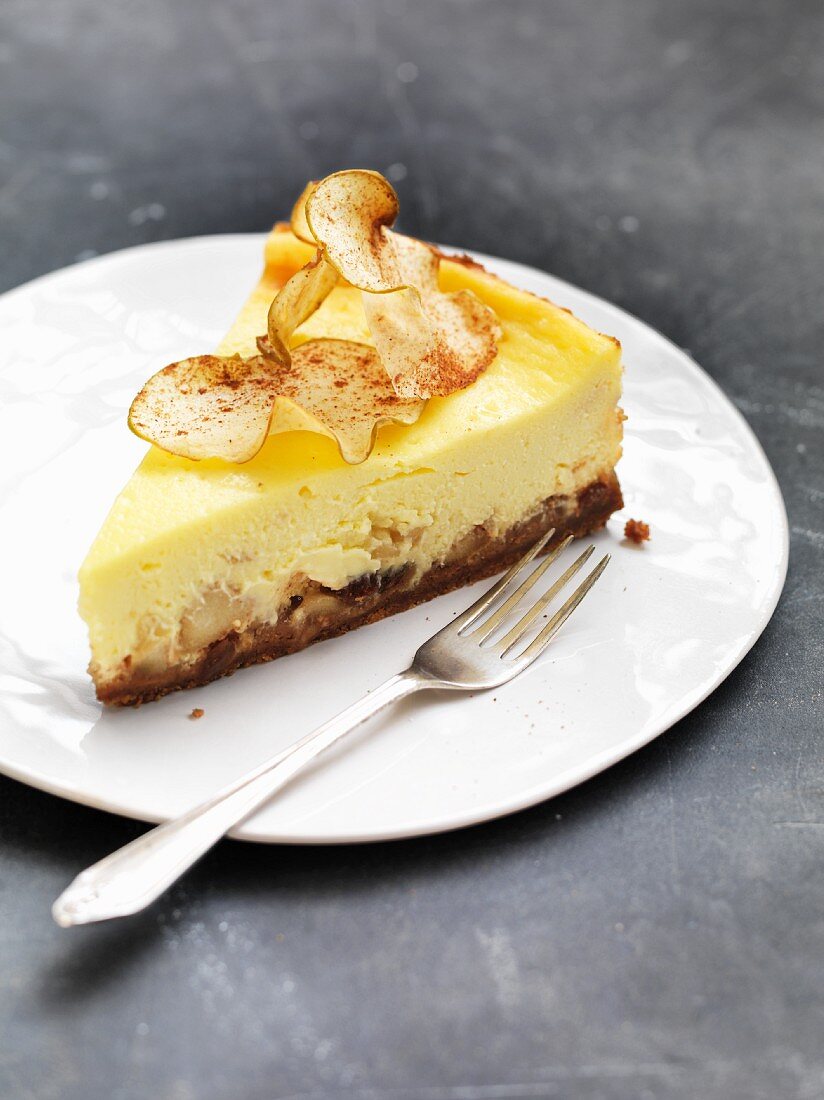 A slice of cheesecake with Bramley apples