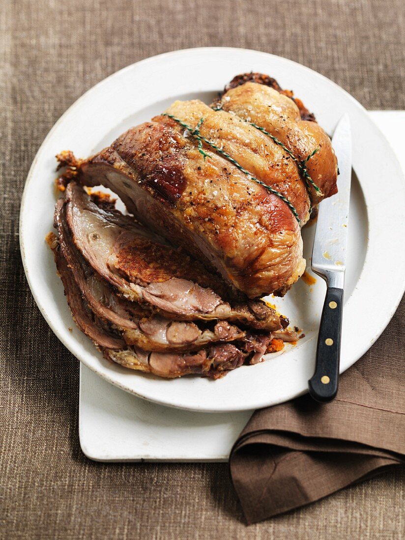 Slow roasted shoulder of lamb with a fennel and sausage stuffing