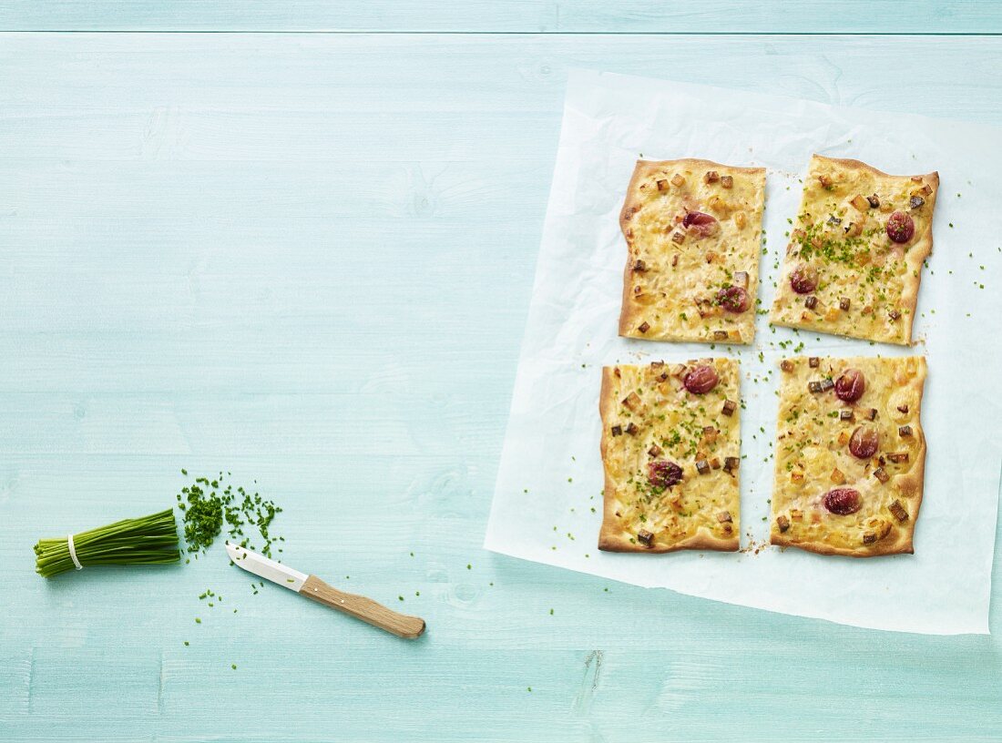 Onion cake with red grapes
