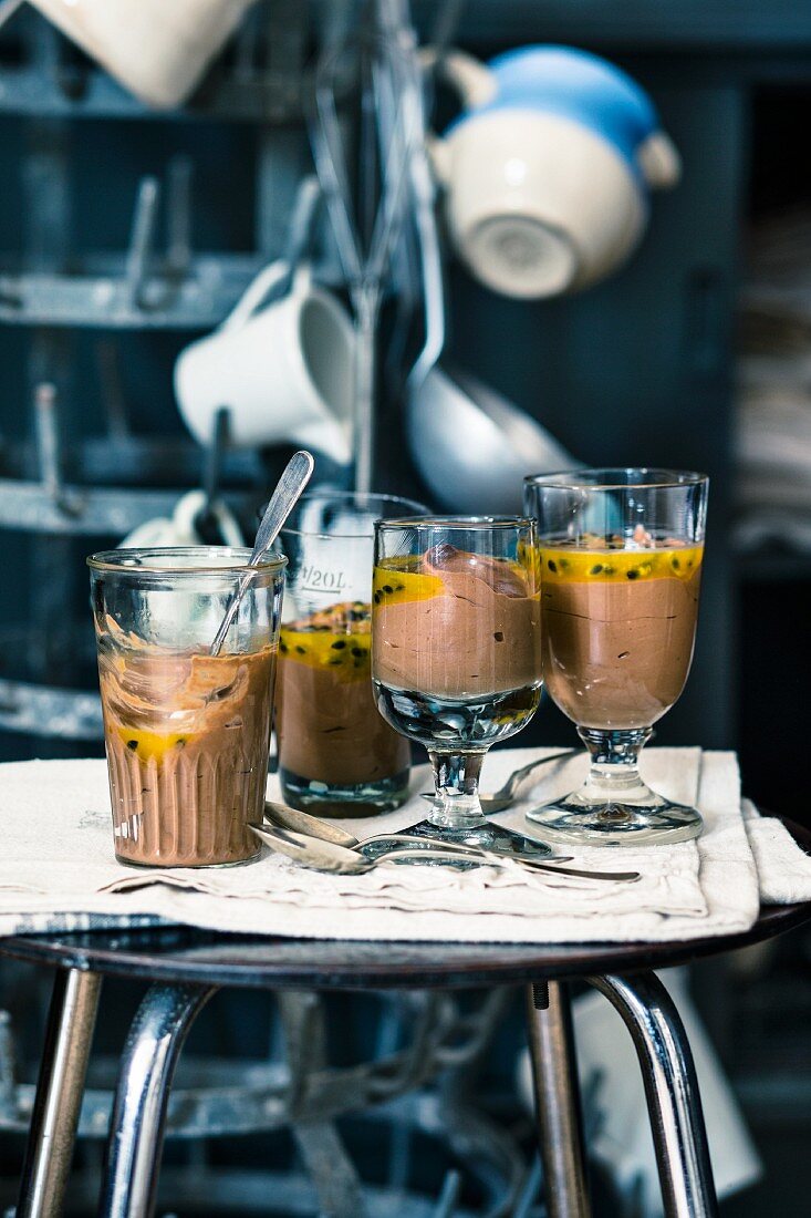 Mousse au chocolat with passion fruit sauce