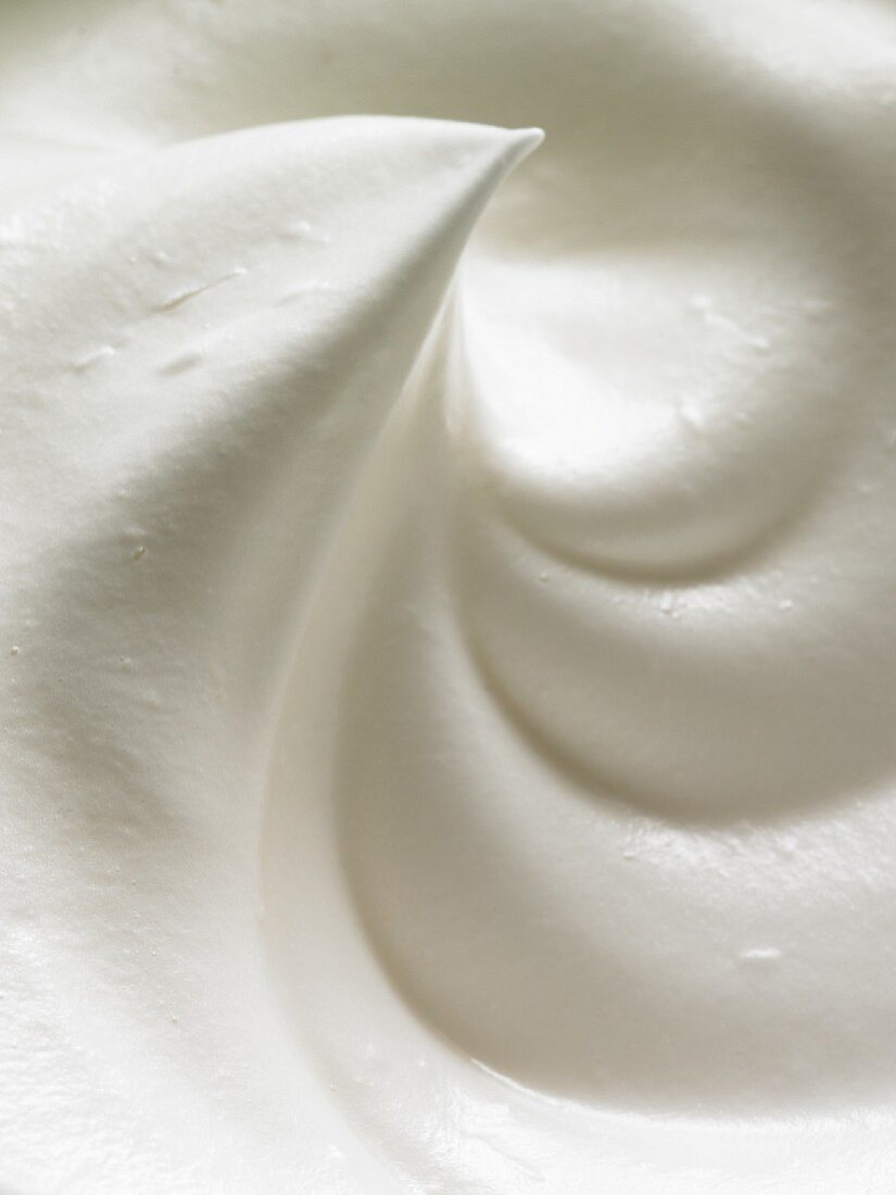 A close-up of meringue mixture