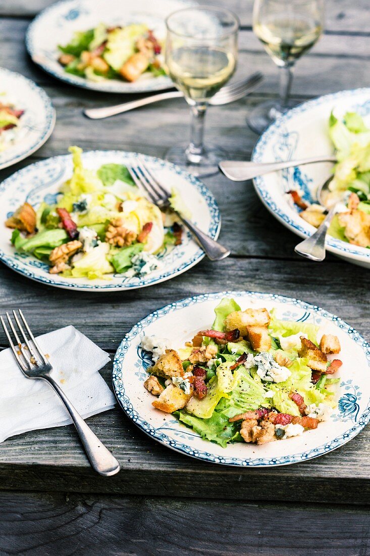 Chicory salad with bacon, blue cheese and croutons