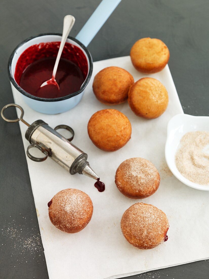 Stuffed cherry doughnuts with cinnamon sugar