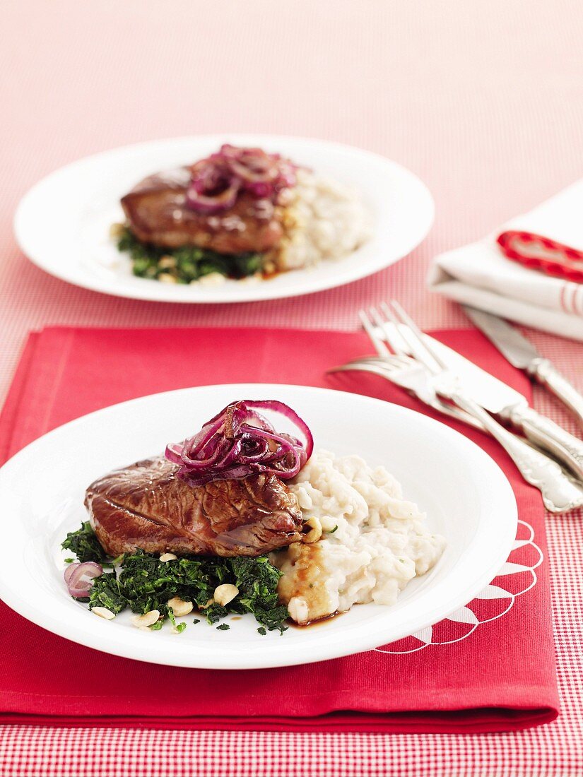 Lamb with bean mash and nutty spinach