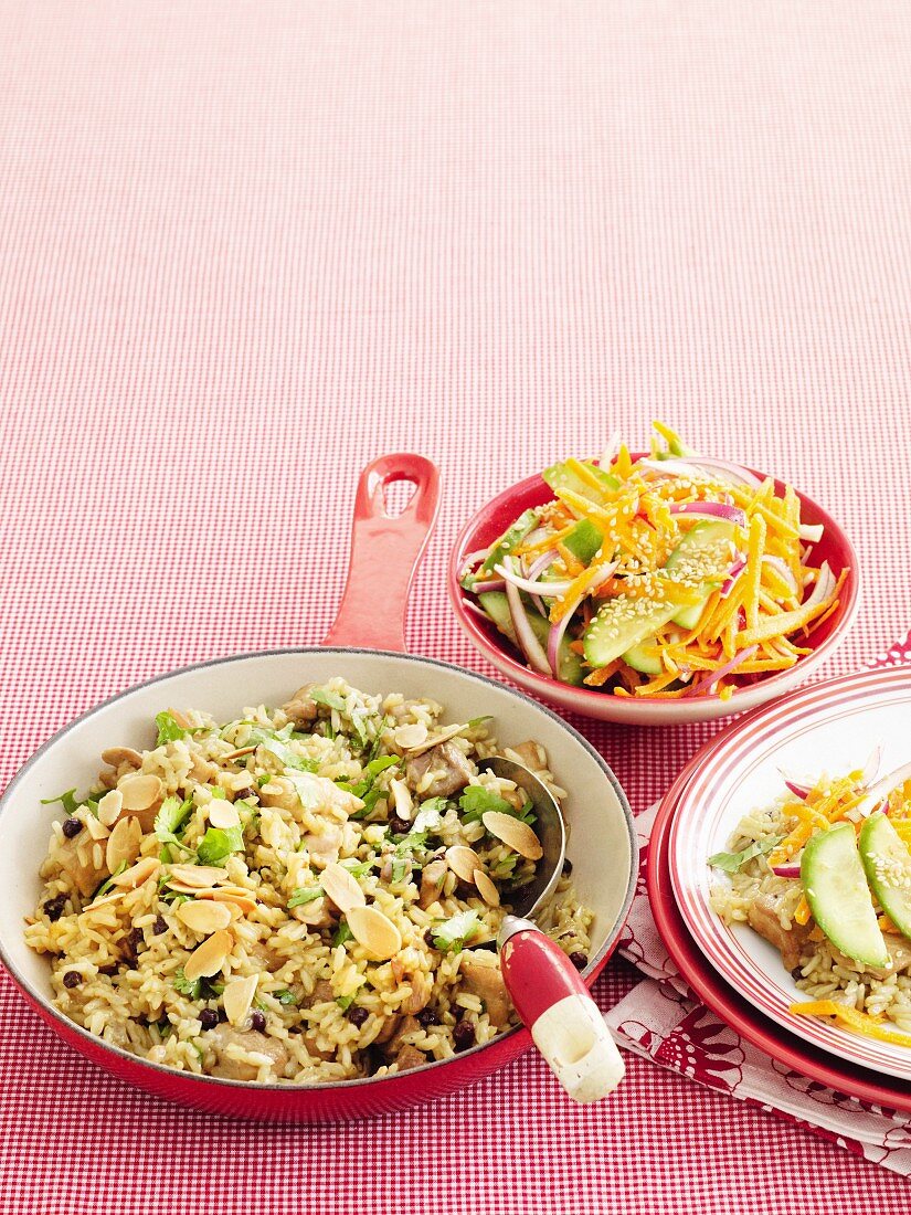 Chicken pilaf with carrot and cucumber salad