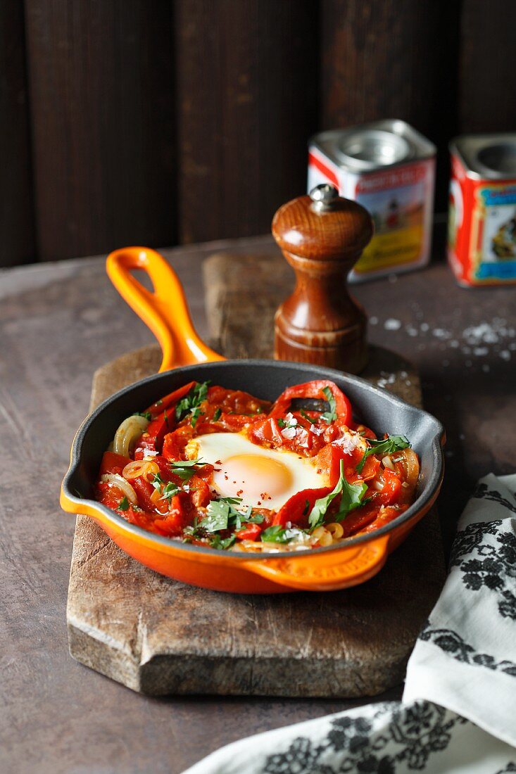 Schakschuka (eeg dish with pepper and tomatoes, North Africa)