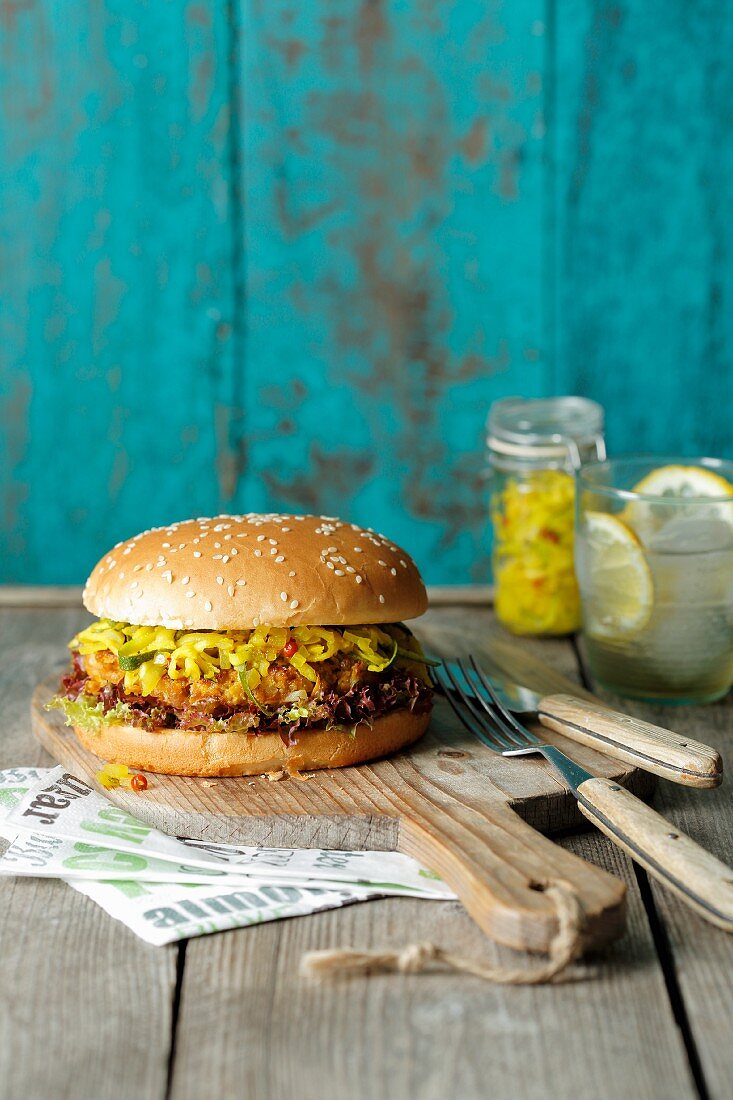 A veggie burger with courgette relish