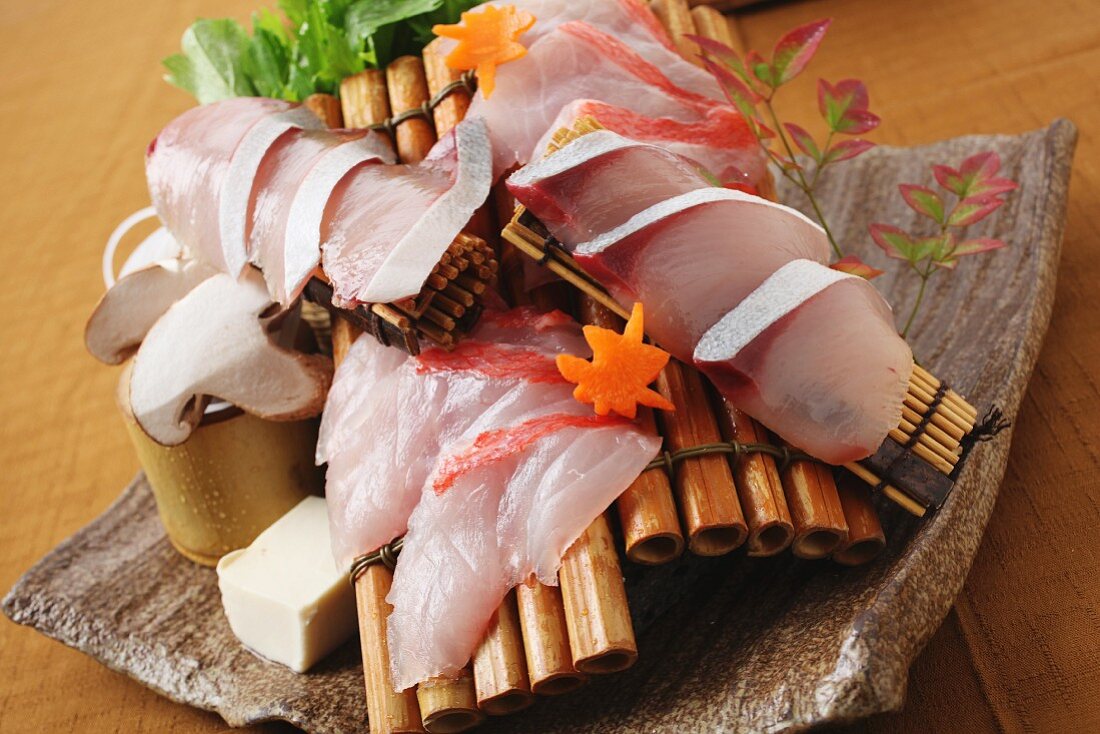 Yellowtail sashimi with mushrooms and tofu (Japan)