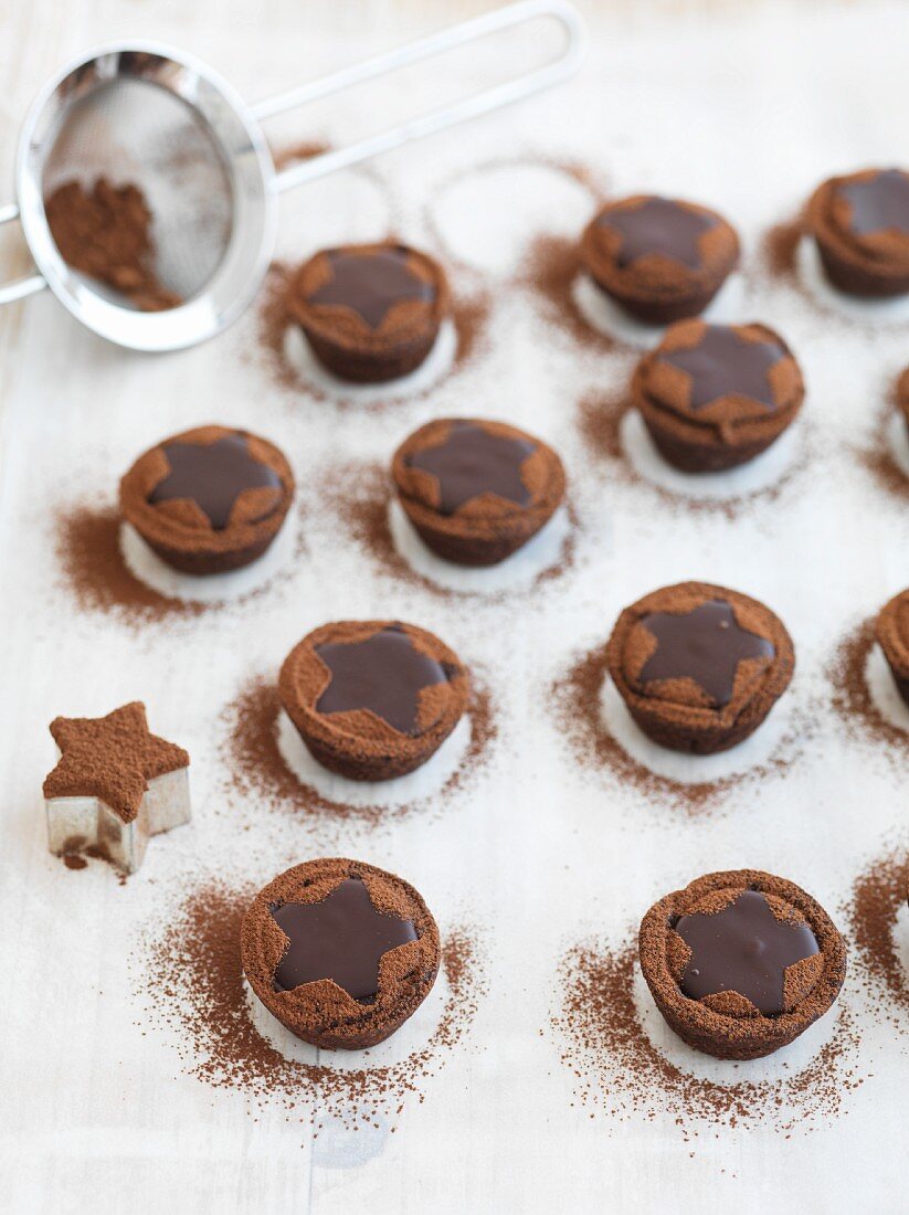 Baileys chocolate tarts dusted with cocoa powder