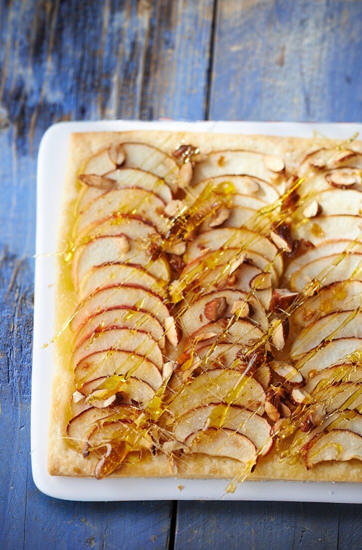 Caramelised apple tart with flaked almonds
