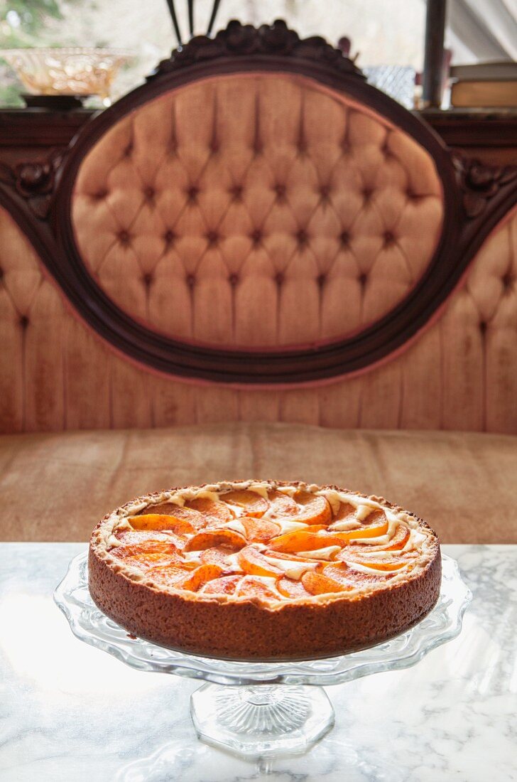 Peach tart on a coffee table