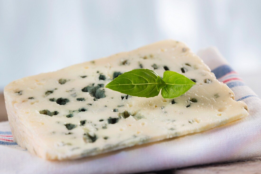 A slice of Roquefort Marival (French blue cheese)