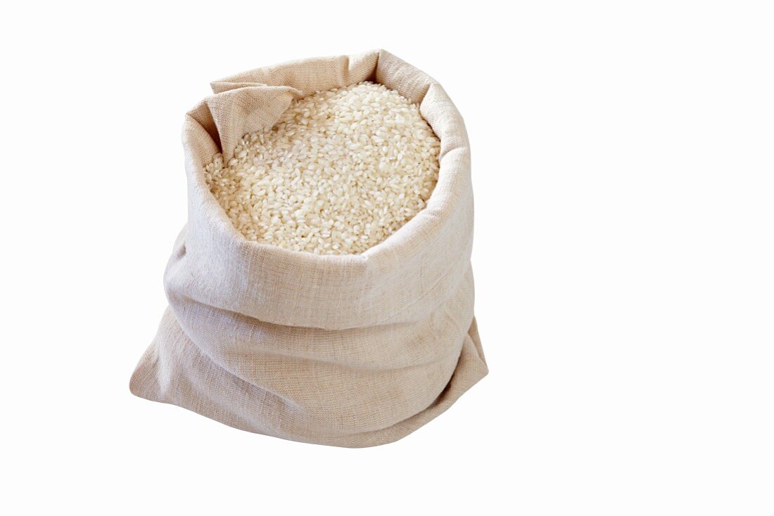 White rice in a linen sack