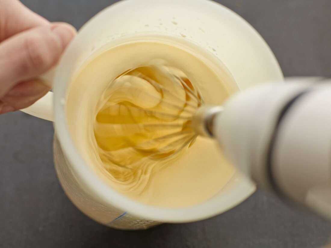 Advocaat cream being made from cream, sour cream and advocaat