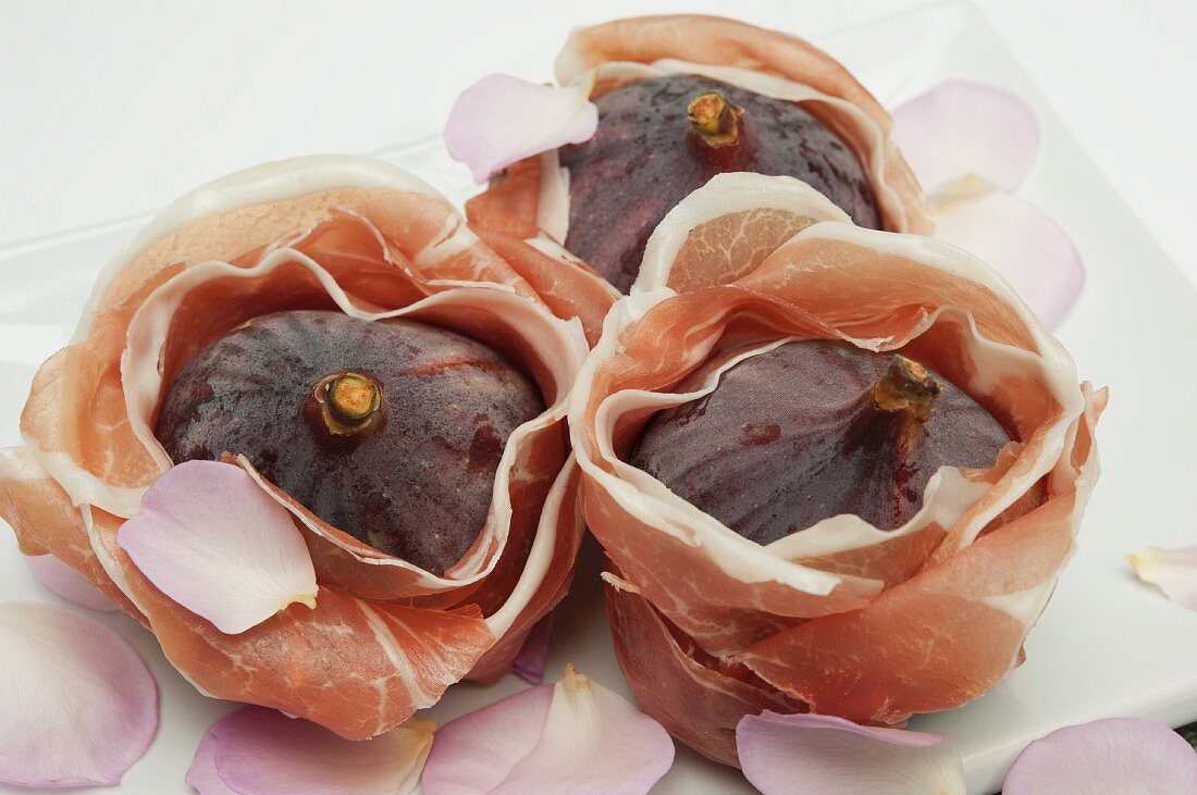 Prosciutto Wrapped Figs on White Platter           