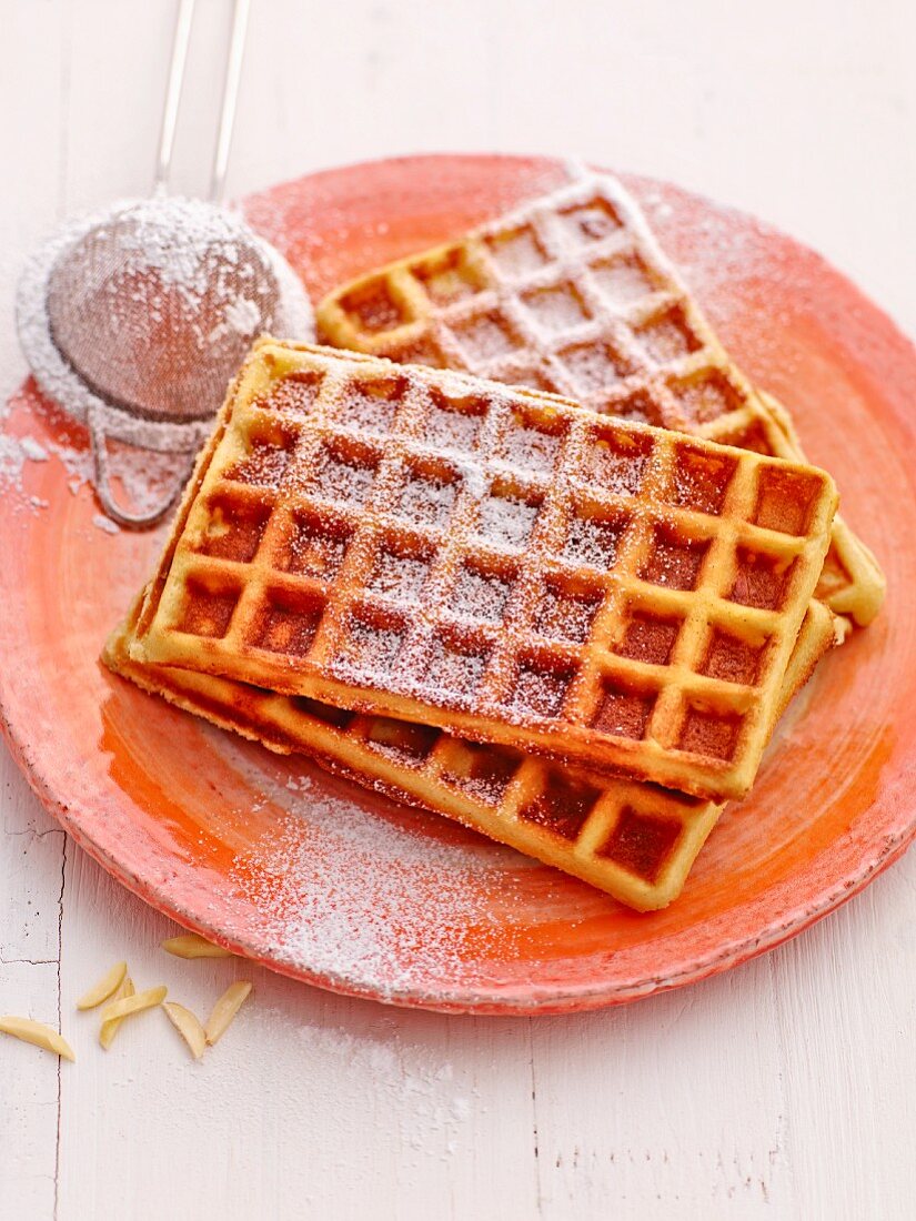 Almond waffles with icing sugar