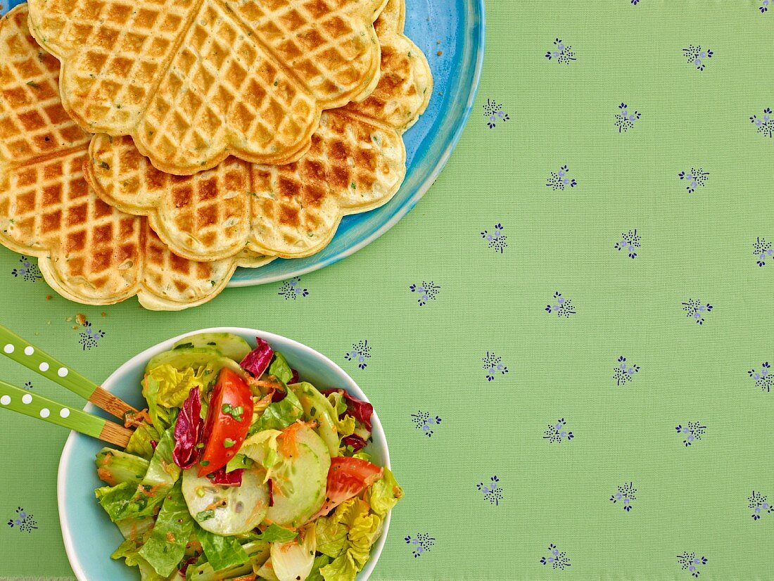 Herb and sour cream waffles served with salad