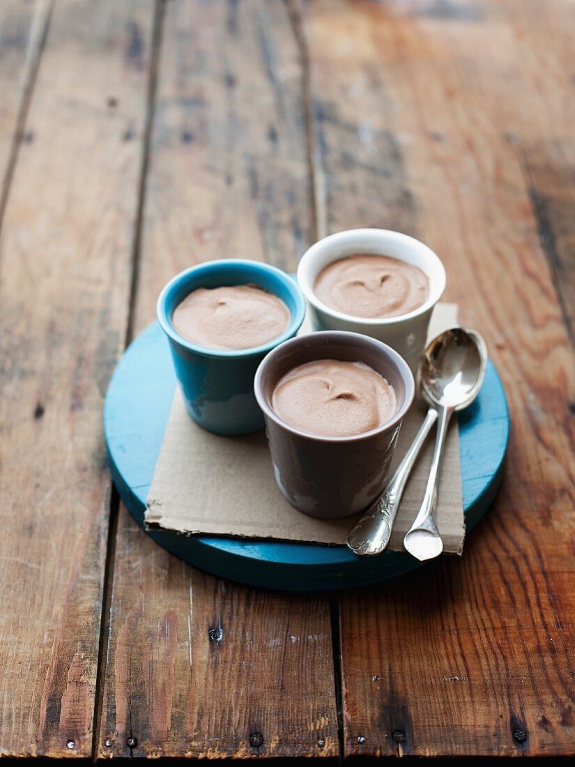 Three cups of homemade chocolate ice cream