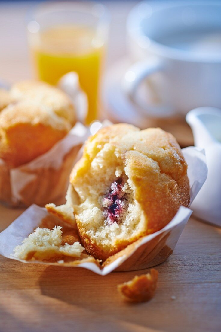 A vanilla muffin with a fruit core