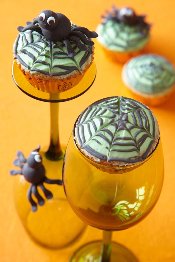 Halloween muffins with spiderweb toppers