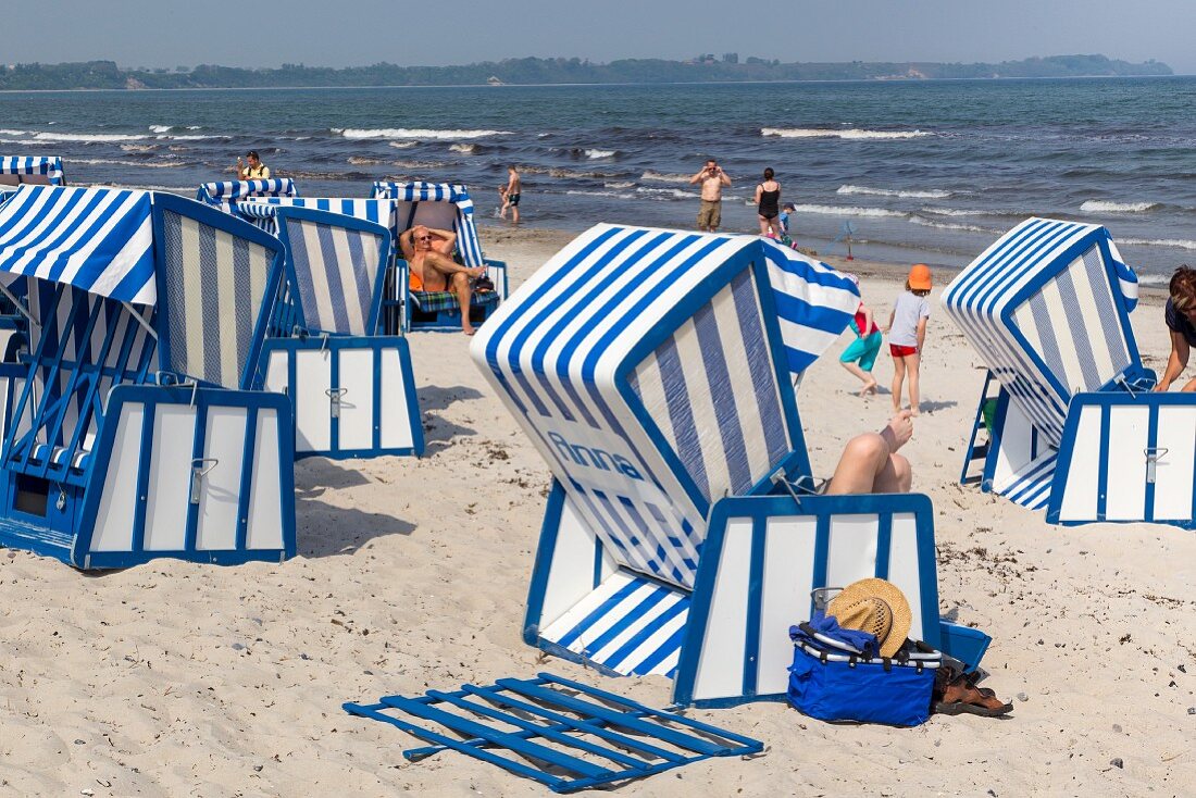 Blue-and-white beach chairs on the beach at Schaabe, Breege-Juliusruh