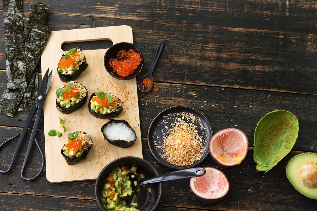 Gunkan sushi with avocado and caviar