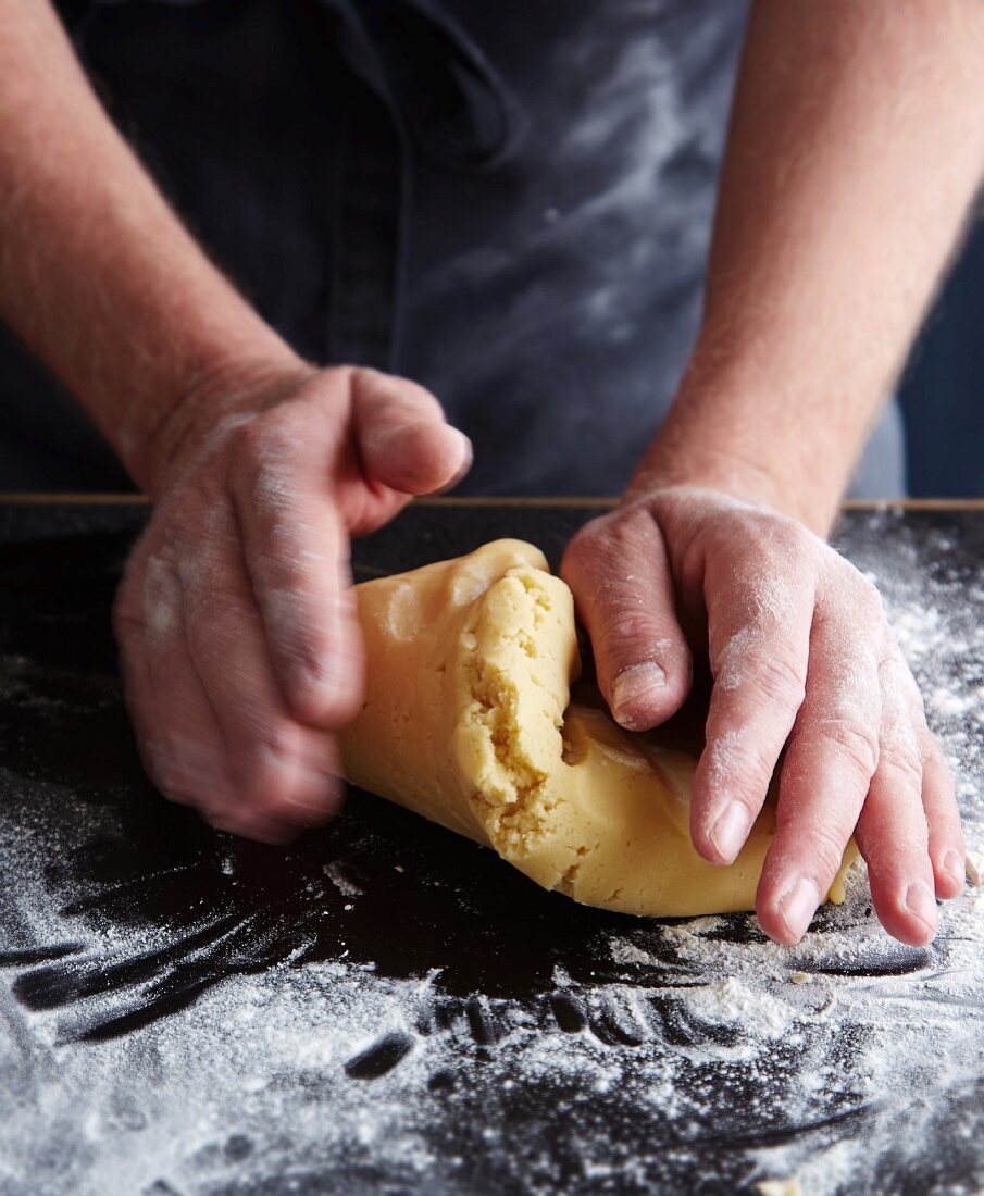 Shortcrust pastry being kneaded