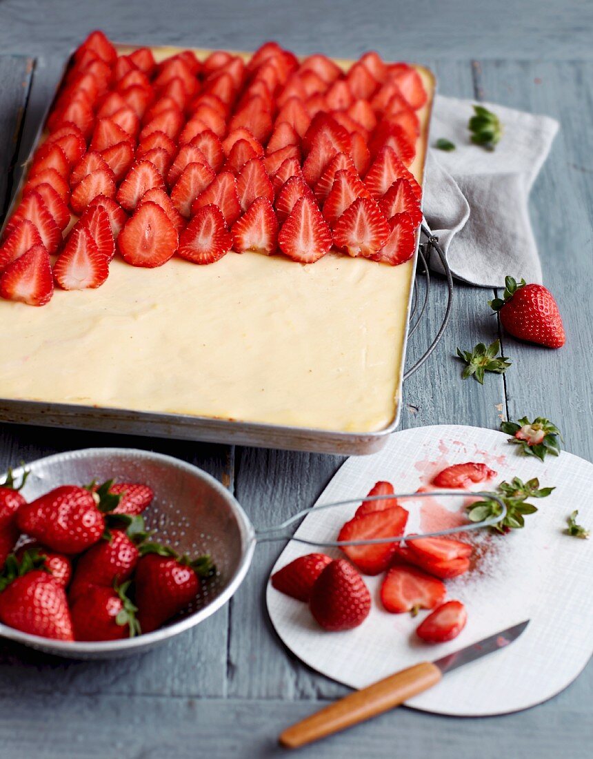 Strawberry tray bake cake being made