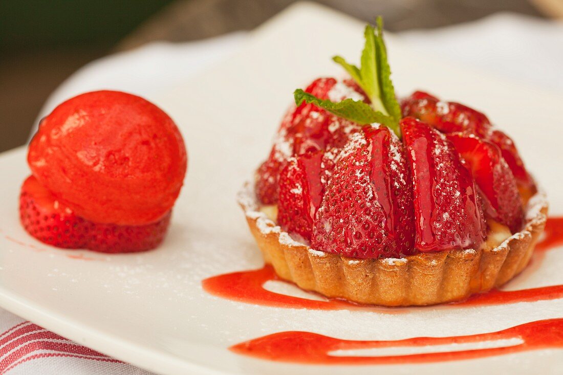 A strawberry tartlet and strawberry sorbet