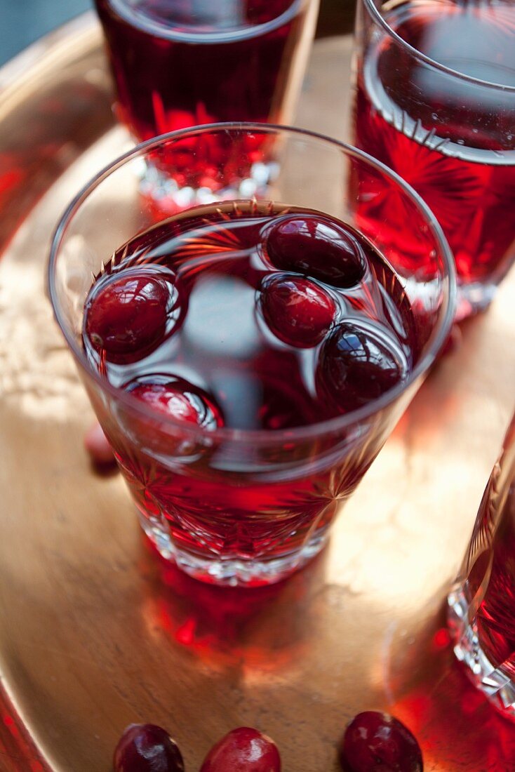 Four glasses of cranberry juice