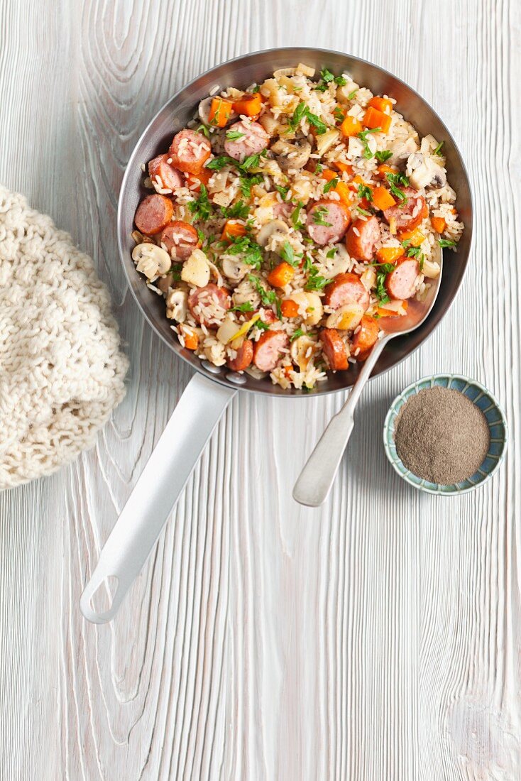 Fried rice with sausage and carrots