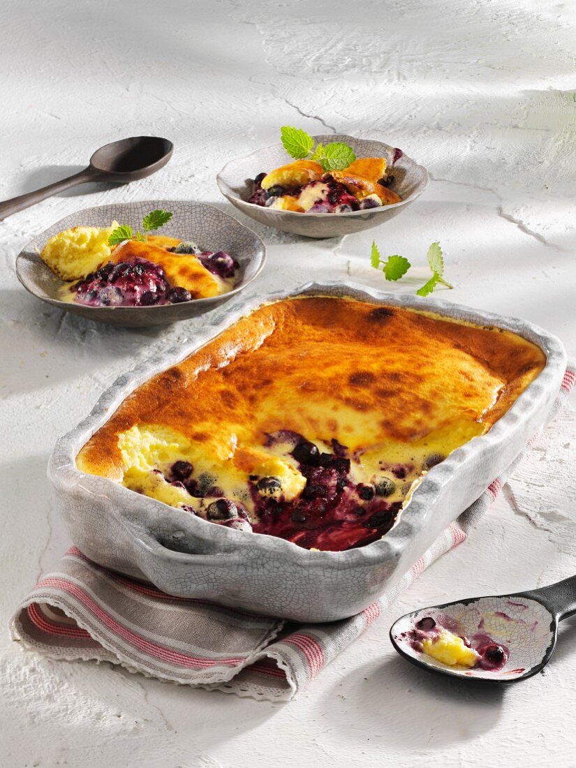 Blueberry gratin in a rustic baking dish