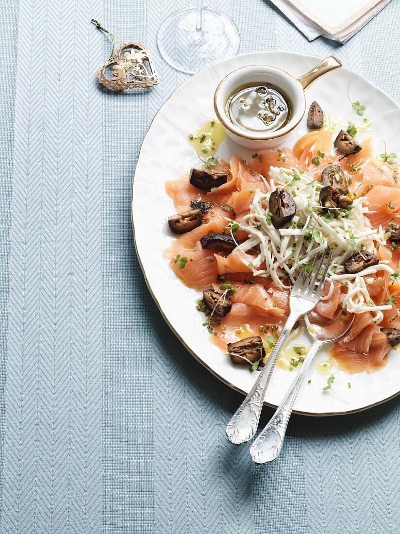 Smoked salmon with a celery and pear salad and preserved walnuts