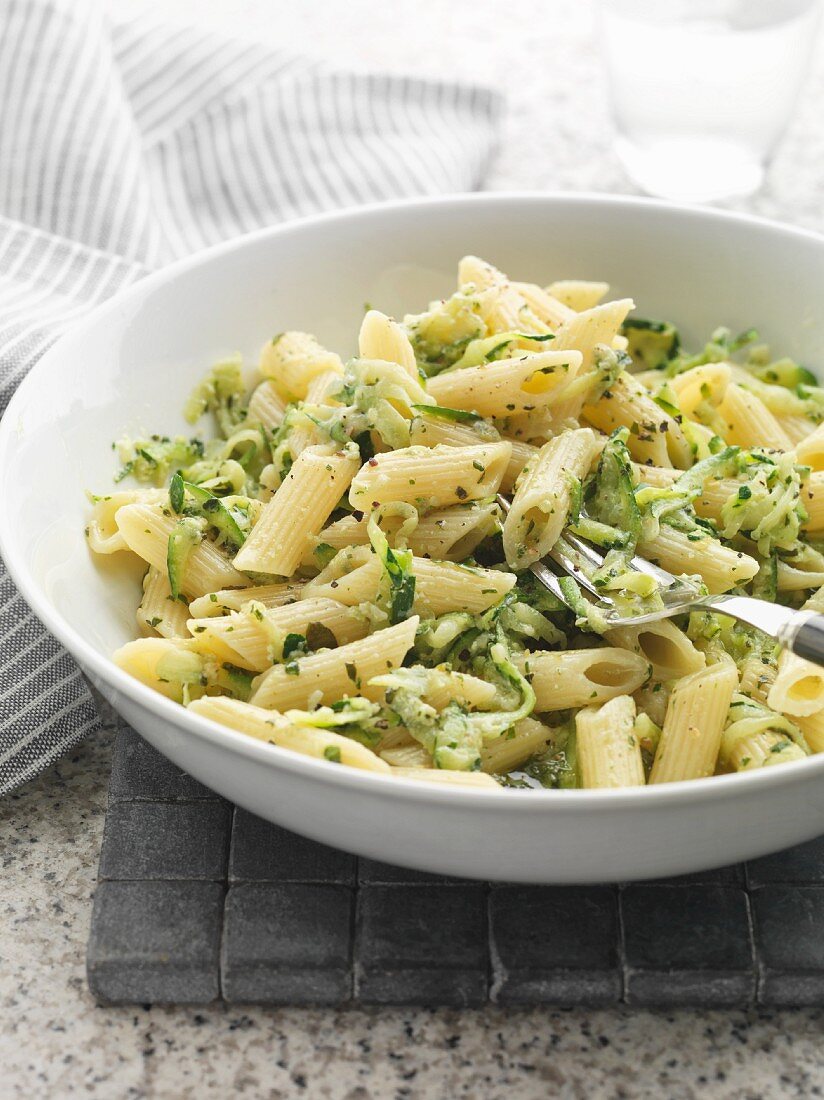 Pasta with basil pesto and courgette