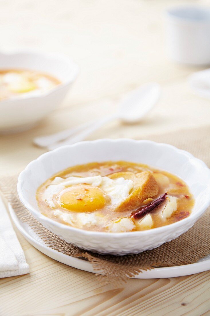 Bread soup with cod and fried egg (Spain)