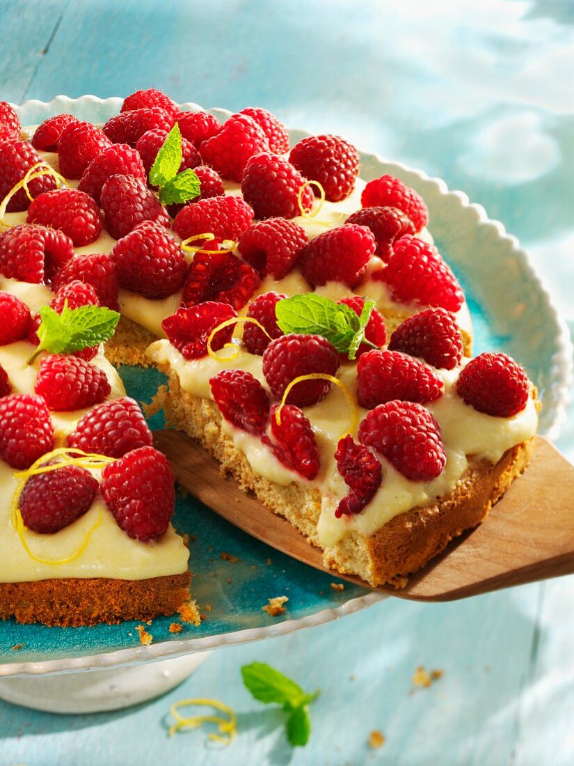 Spelt cake with lemon cream and raspberries