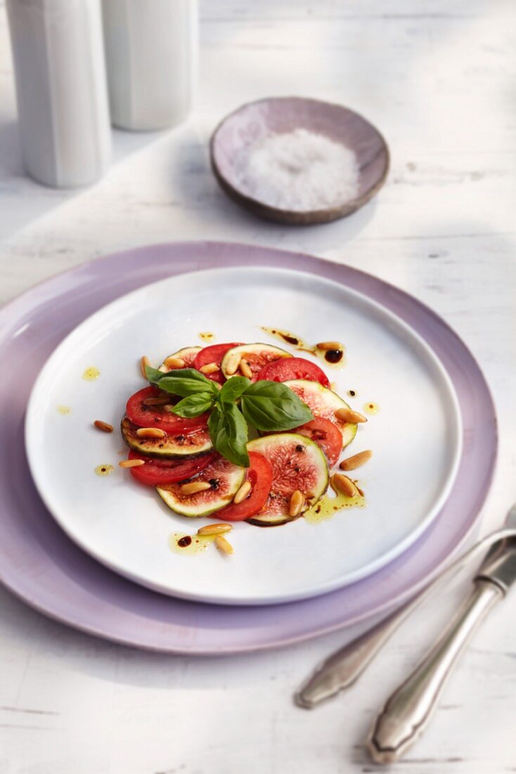 Fig and tomato carpaccio with pine nuts